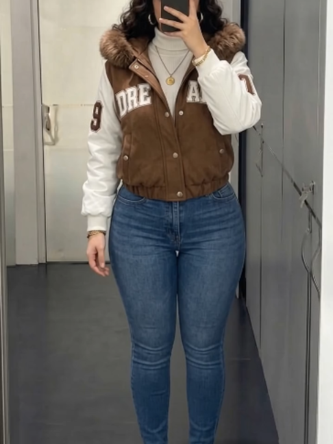 This brown and white college-style jacket with a faux fur collar is perfect for… TikTok video