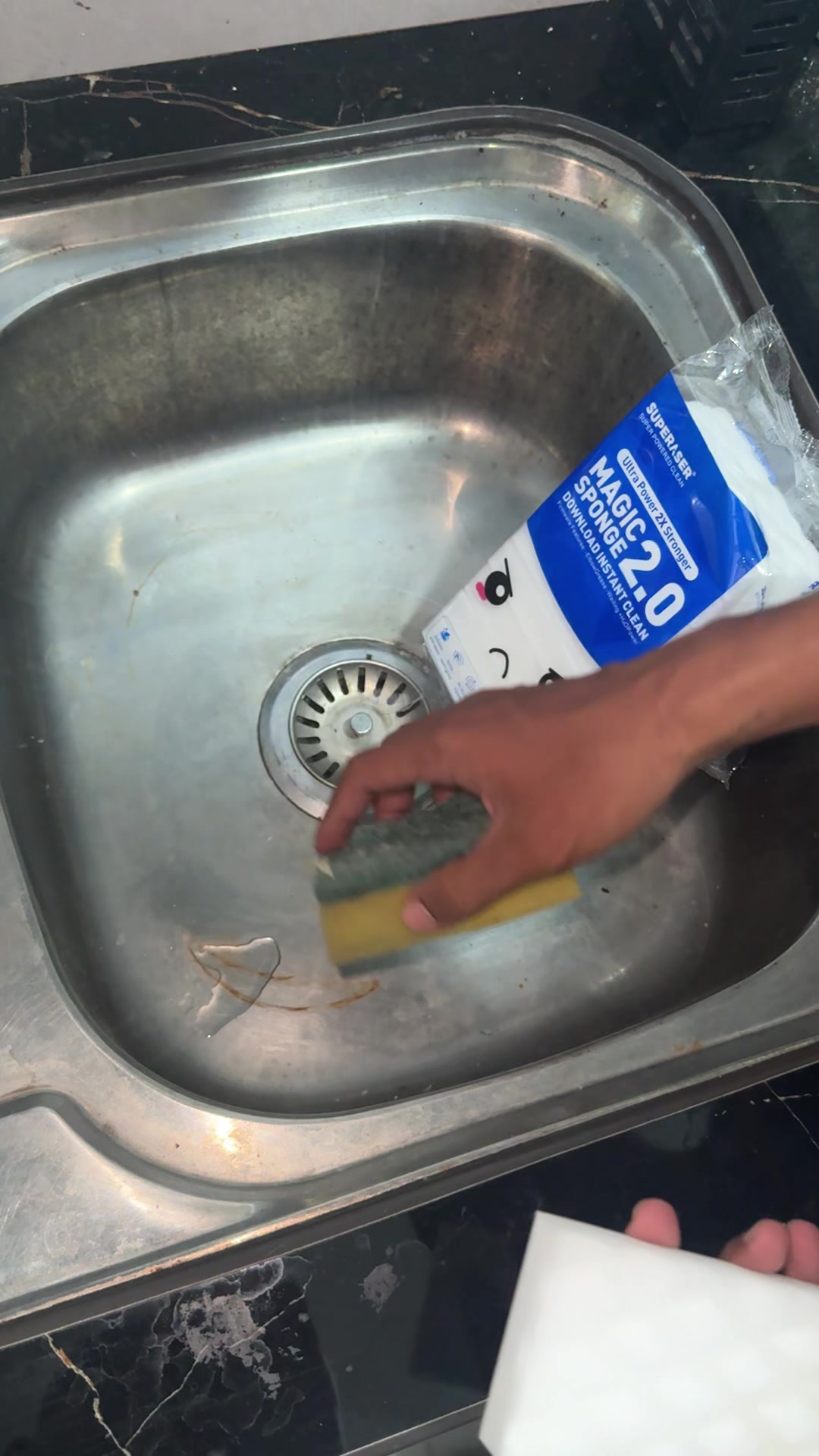 This is the magic sponge, and this is an ordinary cleaning sponge. TikTok video