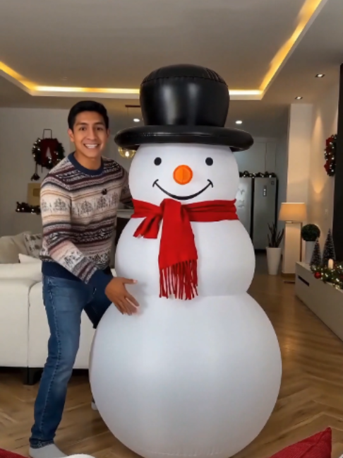 Hey everyone, look at this inflatable snowman with a hat and scarf design, it looks… TikTok video